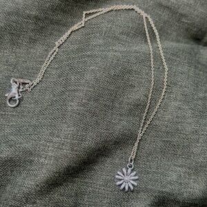 Beautiful silver color necklace with cute flower charm